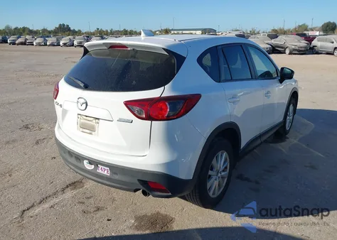 2013 Mazda Cx-5 Touring z USA, uszkodzony, nr VIN JM3KE2CE3D0105352